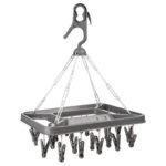 Rectangular plastic drying rack with 26 clothes pegs